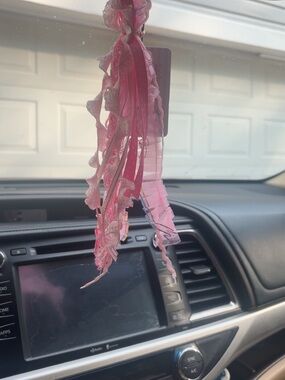 mainly pink car tassel